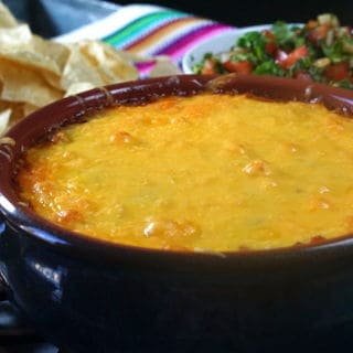 Easy Cheesy Bean Dip is perfect for tailgating and enjoying the big game!